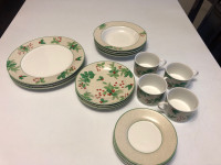 Christmas dinnerware set with holly and berries