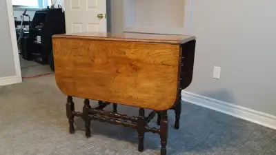 Antique drop-leaf dining table, View more