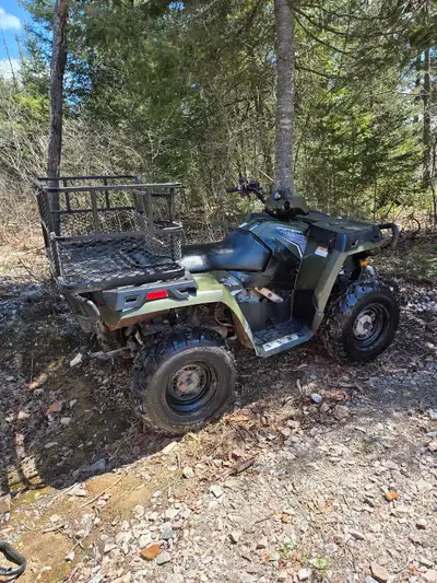 7153kms, front tires 3 yrs old, rear tires new, custom dog carrier included as well as gun rack, win...