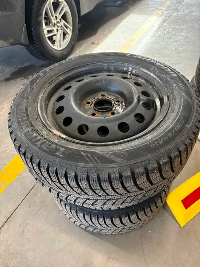 4 - 205/60/R16 winter studded tires on 5 bolt pattern rims…great condition. Came off a Kona, will fi...