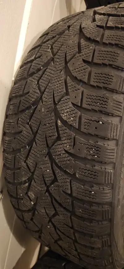 Four winter tires Toyo Observe G3-Ice 225 45 R17. Mounted on alloy 17" rims in good condition. The b...