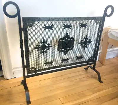 Vintage fireplace screen, purchased at at antique shop in Bruxelles in the early 1960's, solid iron...