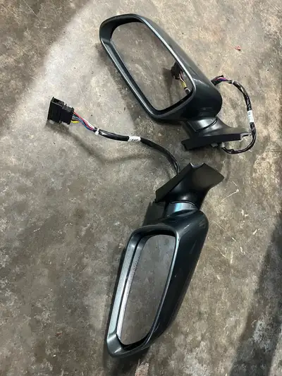 Both left and right door mirror assemblies. In good used condition. Both go together. $60