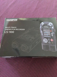 Olympus LS-100 pocket 8-tracks uncompressed  PCM  recorder