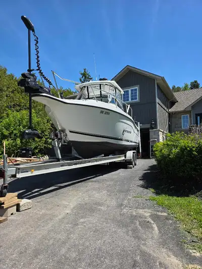 Fishing boat 2001 seaswirl striper 2600 walk around 5.7 volvo penta gsi,9.9 Yamaha kicker, minnkota...
