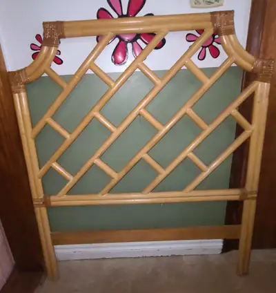 We have a RATTAN CHIPPENDALE HEADBOARD for sale for twin beds it is in very good condition if intere...
