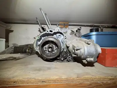 Not a complete engine. Needs head, piston, both side covers. Included are some new parts, gaskets et...