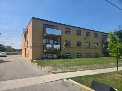Large freshly renovated 2 bed + Den 1 bath with free parking spot heat and water balcony 1st floor b...