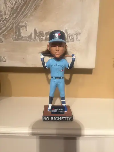 This is a pre-owned Bo Bichette bobblehead in good condition. It's a great collectible for any Toron...