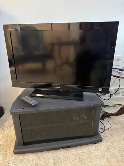 Sony Bravia 32” TV and JVC Stand, View more
