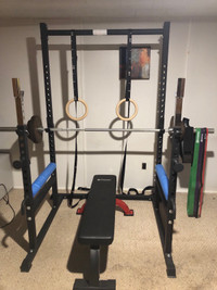 Squat  rack and Olympic weights 