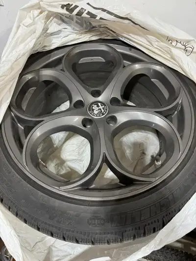 Selling a set of OEM 18-inch 5-hole rims from an Alfa Romeo Giulia, mounted with Michelin Pilot Alpi...