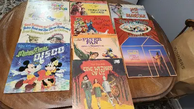 Children's Records. Raffi is brand new not open. Mary Poppins book is not joined anymore. They are i...