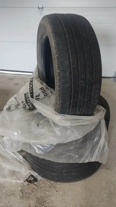 Set of 4 all-season tires, size 235/50R18. 3 tires in good usable condition 1 tire has a sidewall bu...