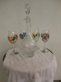 Decanter with four hand painted  glasses.