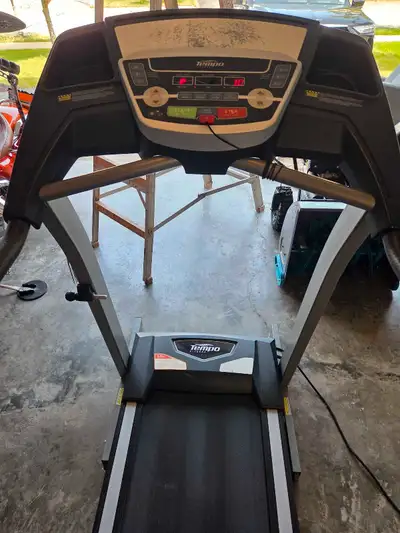 Get your heart pumping with this Tempo treadmill, perfect for home workouts! This is a used treadmil...