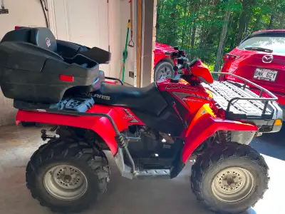 Polaris Sportsman 500 HO à vendre avec seulement 3,308km. En excellente condition. Toujours été dans...