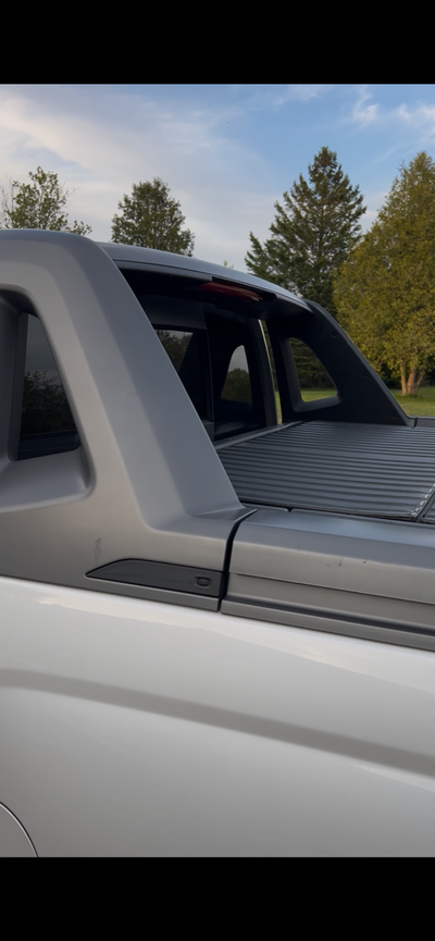 Sports bar and box insert. Comes off of my 2017 Silverado in good condition. Most of the hardware is...