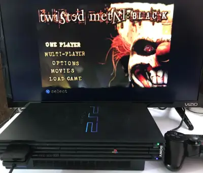 This is a FAT PS2 system with an SSD drive Games load fast without all the noise. I can customize th...