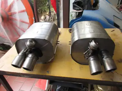 Exhaust silencers Ferrari 550 Maranello and Barchetta, original, used. Part number 167998 and 167999...