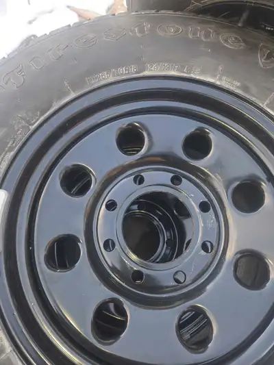 Tires and rims for sale 265 70 18s like new for a 2500 hd gmc 2017 or different years sensors also p...