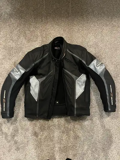 Selling a men’s Made2Ride leather motorcycle jacket. It is labelled as size Small but also as US siz...