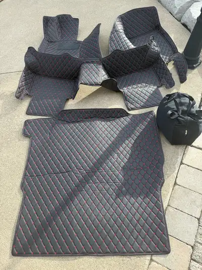 Custom full coverage mats and trunk mat. Black with Red stich also indoor cover cover