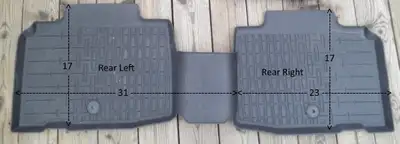 Two-piece rear floor mats, all weather style mats, thick black rubber, raised edge to keep the water...