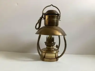 Very good condition. No cracks in glass chimney. Comes with original brass swivel eye boat snap. 10....