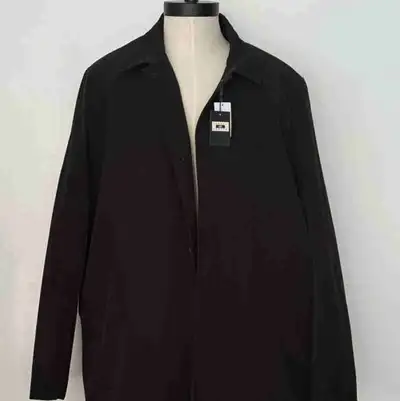 Elevate your cold-weather wardrobe with this sophisticated Joseph Abboud overcoat in classic black....