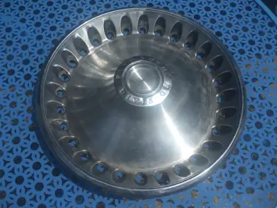 Plymouth Division late 60's or early 1970s 14" used hubcap in good condition, 1 only