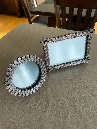 Made from real recycled bicycle chain. Two frames, one 5 X 7 and one 5” dia. Perfect for the Cyclist...