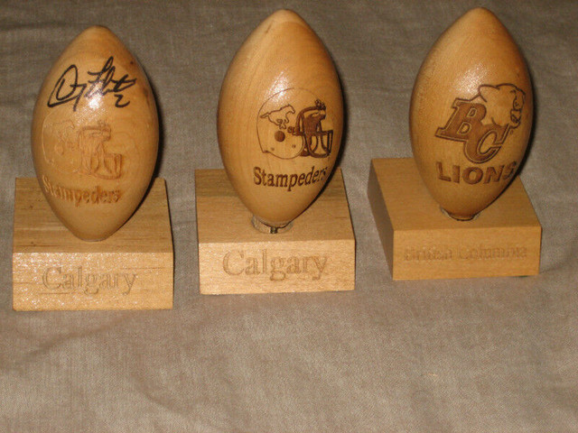 CFL Stampeders Flutie Allan Signed Wooden Football + Bobblehead in Arts & Collectibles in City of Toronto