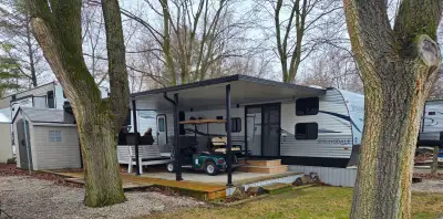 2020 Keystone 39ft bunkhouse camper on a seasonal site at "The Ponderosa " Ipperwash, Ontario. Sleep...