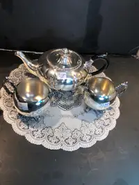 Antique silver plated tea pot, creamer & sugar bowl 