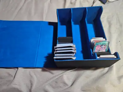 Sport cards/trading card game supplies., View more