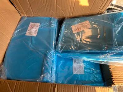 NEW ONE CASE OF (100) BLUE ISOLATION GOWNSAS PICTURED, View more