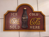 Wooden coca cola sign