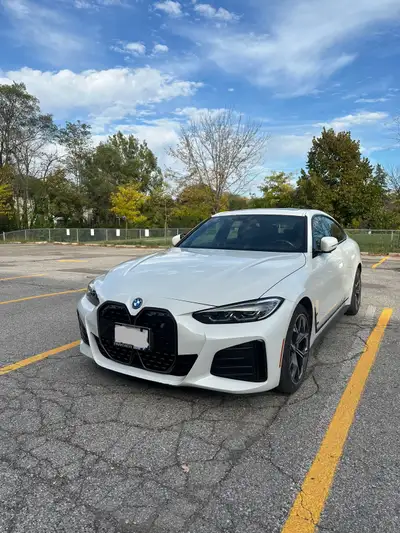2024 BMW I4, M Package, fully electric. Luxury sedan in Alpine white that’s clean and well-maintaine...
