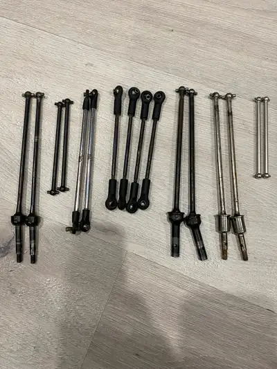 $30 for everything. I'm selling a variety of used RC car parts, including driveshafts and linkages....