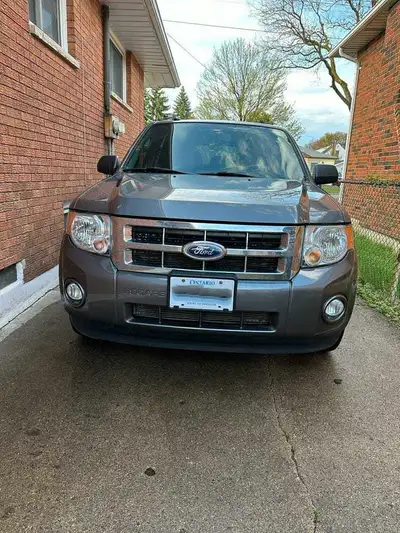 For sale: 2011 Ford Escape in great condition. Recently installed new brakes, comes with both winter...