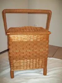 wicker sewing basket on legs