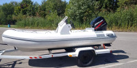 Caribe Inflated Boat with Four Stroke Engine and trailer