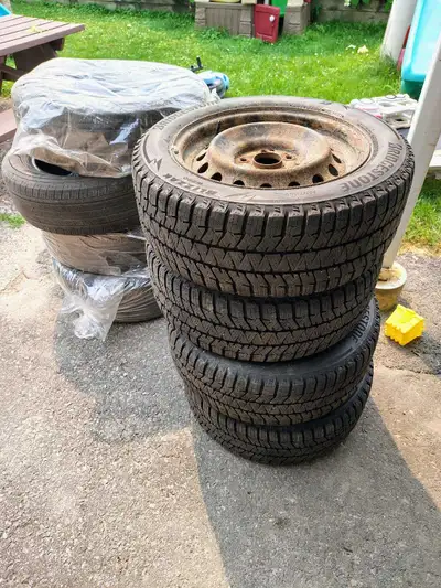 Four winter tires 16" ON RIMS great tread - $200 Four all seasons tires 17" no rims - $20 for all fo...