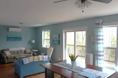 Enjoy the cottage life with relaxation, swimming, boating, and fun with friends. This cottage or hom...