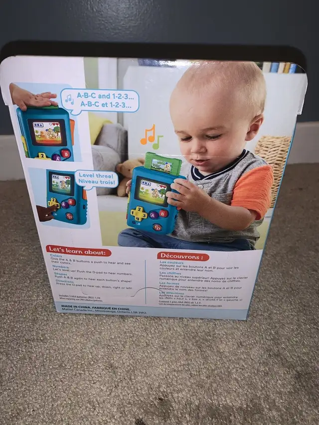 Fisher Price - Laugh & Learn Lil’ Gamer Gameboy. NEW. 6-36 m in Toys in Oshawa / Durham Region - Image 3