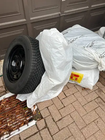 For sale is ford maverick winter tires - 235/65/17 - with tpms! Like new!! Has OEM ford steel rims w...