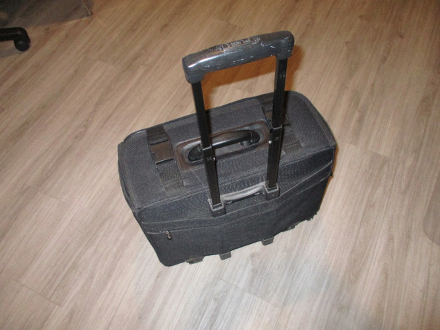 Black Roller Suitcase Large, great for laptops and files in Storage & Organization in Calgary