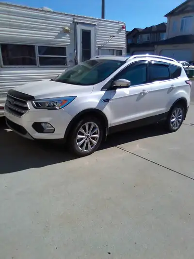 Fully loaded with extra leather seats, winter tires with rims.