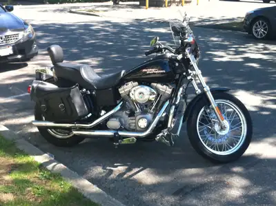 Gently ridden, indoor storage, windshield, leather saddlebags, heated handles, gel seat, roll bar, e...